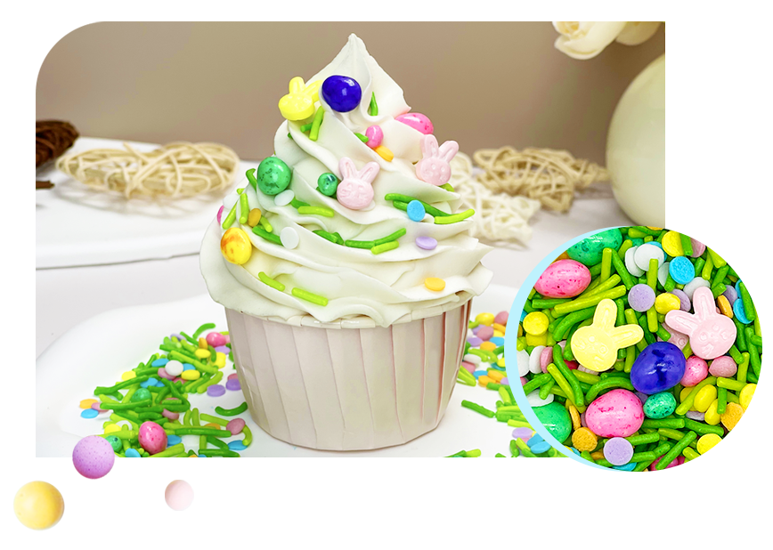 Easter-themed cupcake with white icing and colorful sprinkles, including bunny-shaped candies and speckled eggs, alongside a close-up of the festive cake decoration candy.